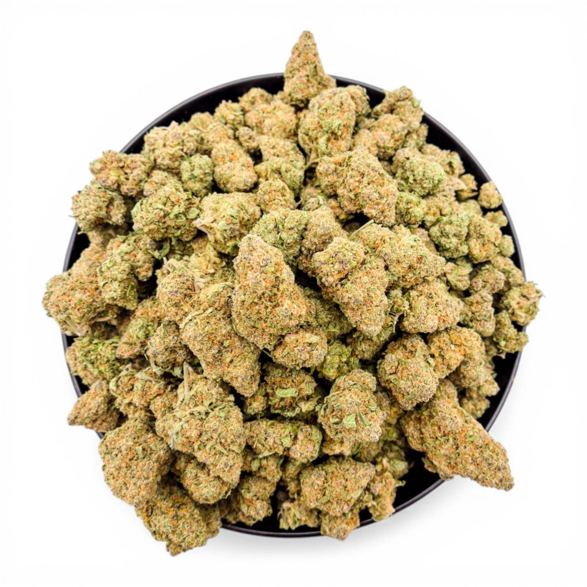 Black bowl filled with green cannabis buds on a white background