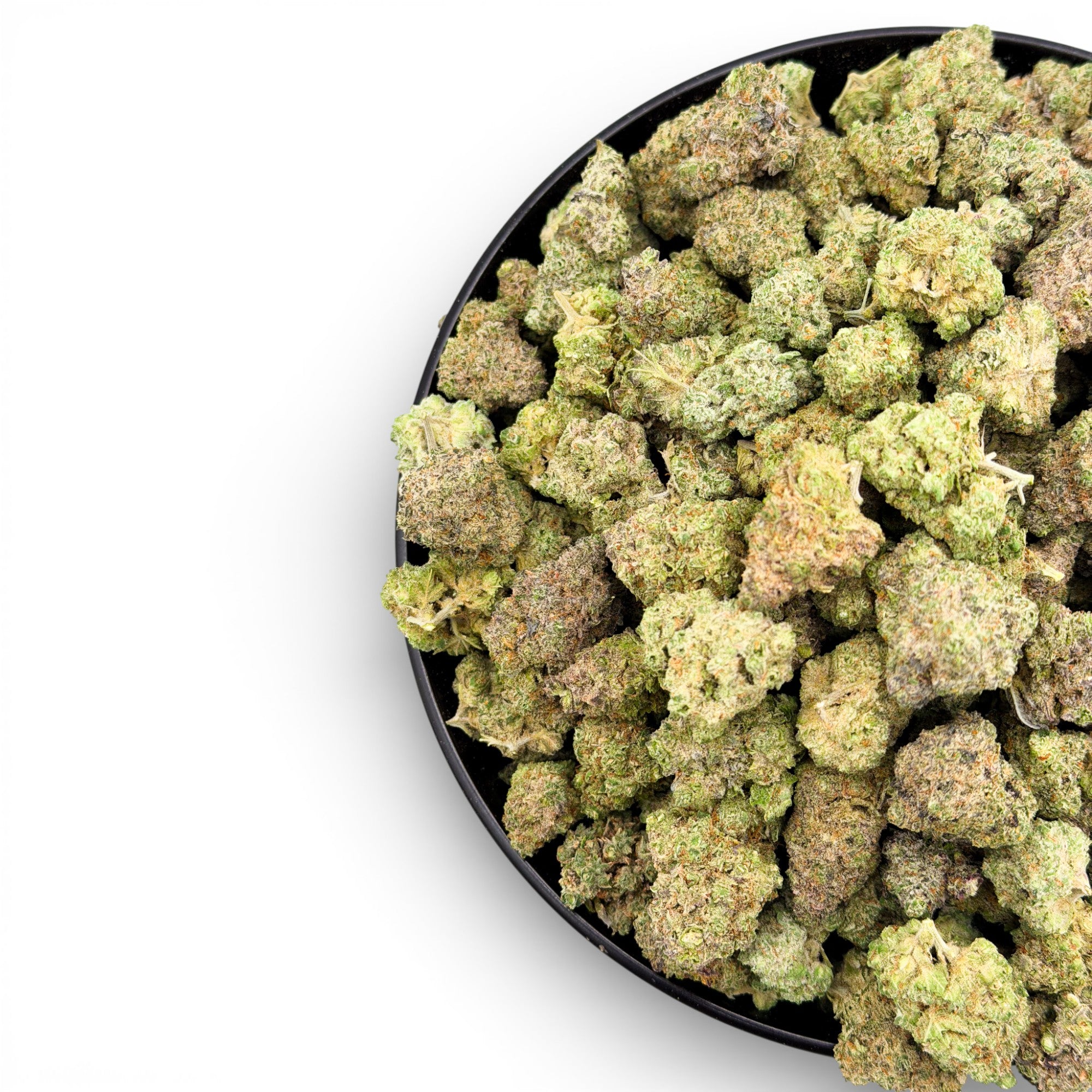 Black bowl filled with green cannabis buds on a white background