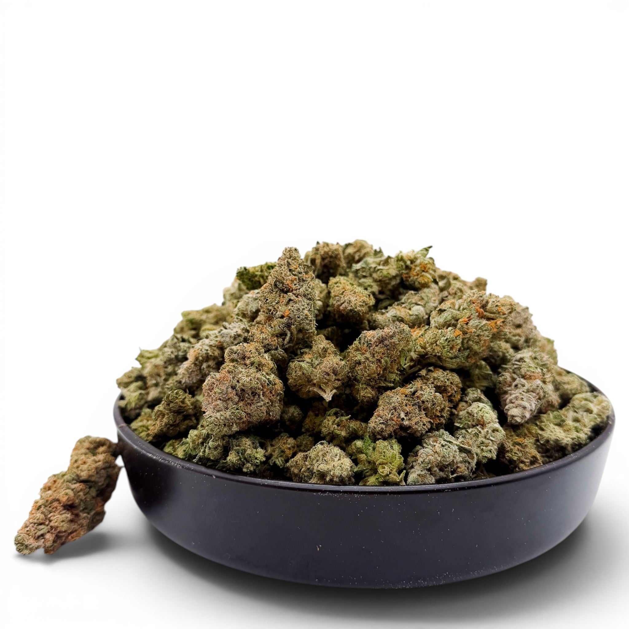 Dr. Wonderstone Alien Wedding THCa flower in a black bowl, featuring dense green buds with orange pistils and trichomes.