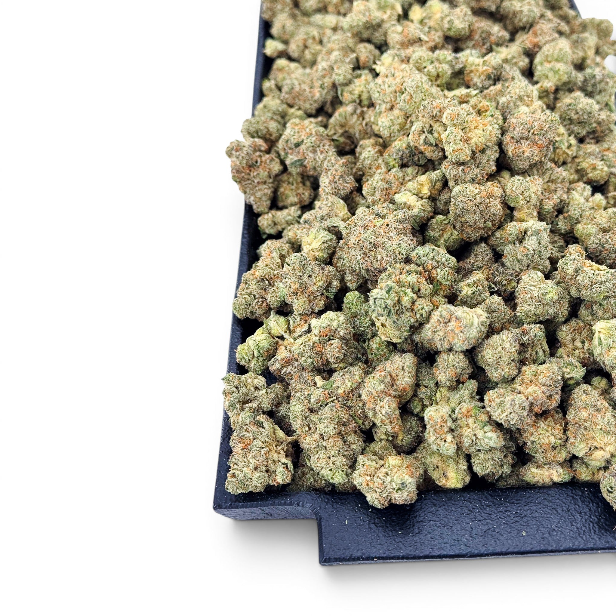 Dr. Wonderstone Banana Zkittlez THCa flower featuring dense, frosted green buds with orange pistils on a black tray.