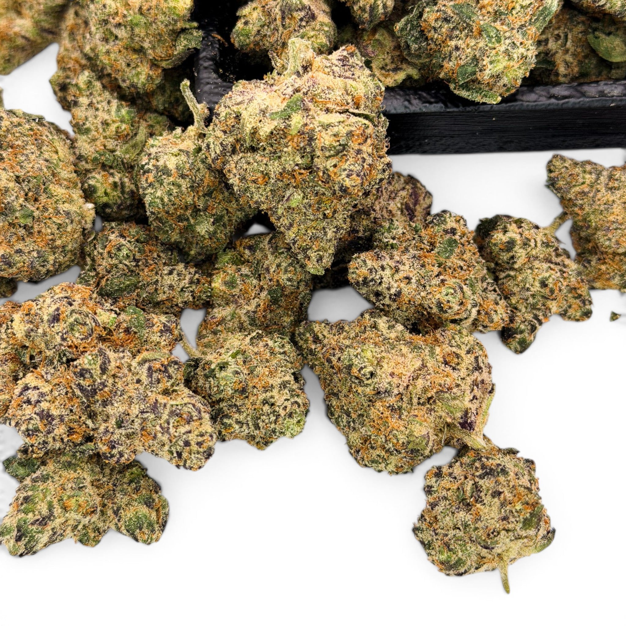 Dr. Wonderstone Blueberry Muffin THCa flower buds with dense green and purple hues, orange pistils, and frosty trichomes.