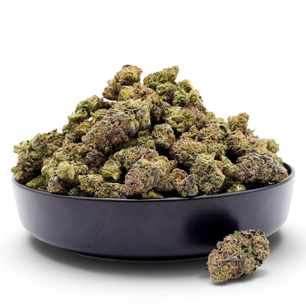 Dr. Wonderstone Cosmic Runtz indoor THCa flower buds with green and purple hues in a black bowl. Buy bulk Cannabis Flower for your retail store.