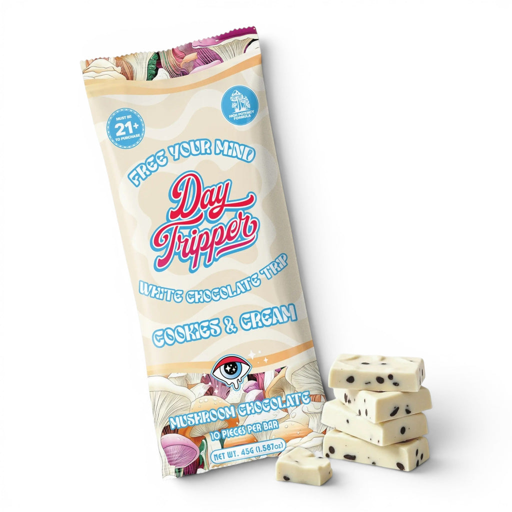 Dr. Wonderstone DayTripper Cookies and Cream white chocolate bar with mushroom-inspired packaging and stacked pieces.