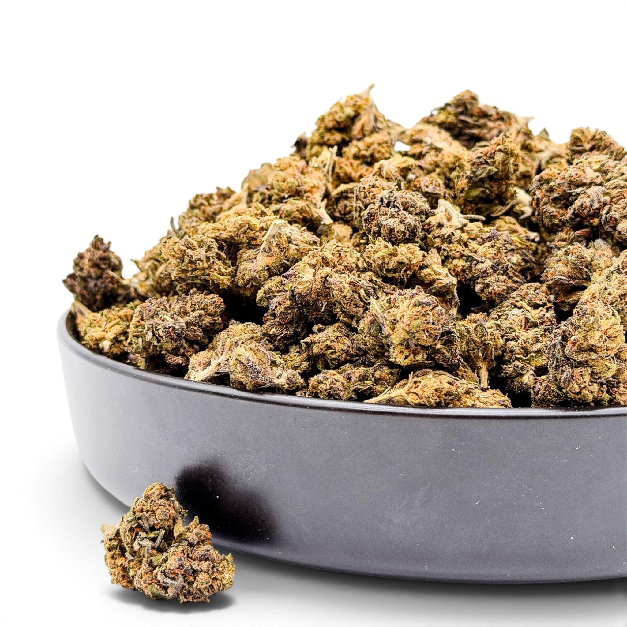 Dr. Wonderstone Gelato Fuel indoor THCa flower buds in a black bowl against a white background.