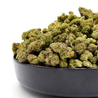 Dr. Wonderstone Gelato Fuel premium THCa flower buds in a black bowl against a white background. Buy Cheap THCa Flower Online