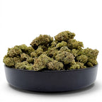 Dr. Wonderstone Hash Burger premium indoor THCa flower buds piled in a black bowl, showing dense green resinous texture.  Buy THCa flower online