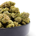 Dr. Wonderstone Hash Burger premium indoor THCa flower buds in a black bowl showing dense green resinous structure - Buy THCa flower online