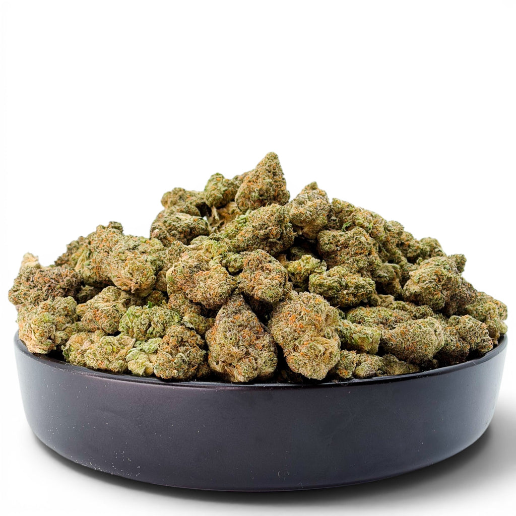 Dr. Wonderstone Ice Cream Pie THCa flower buds with dense structure and trichome coverage in a black bowl.