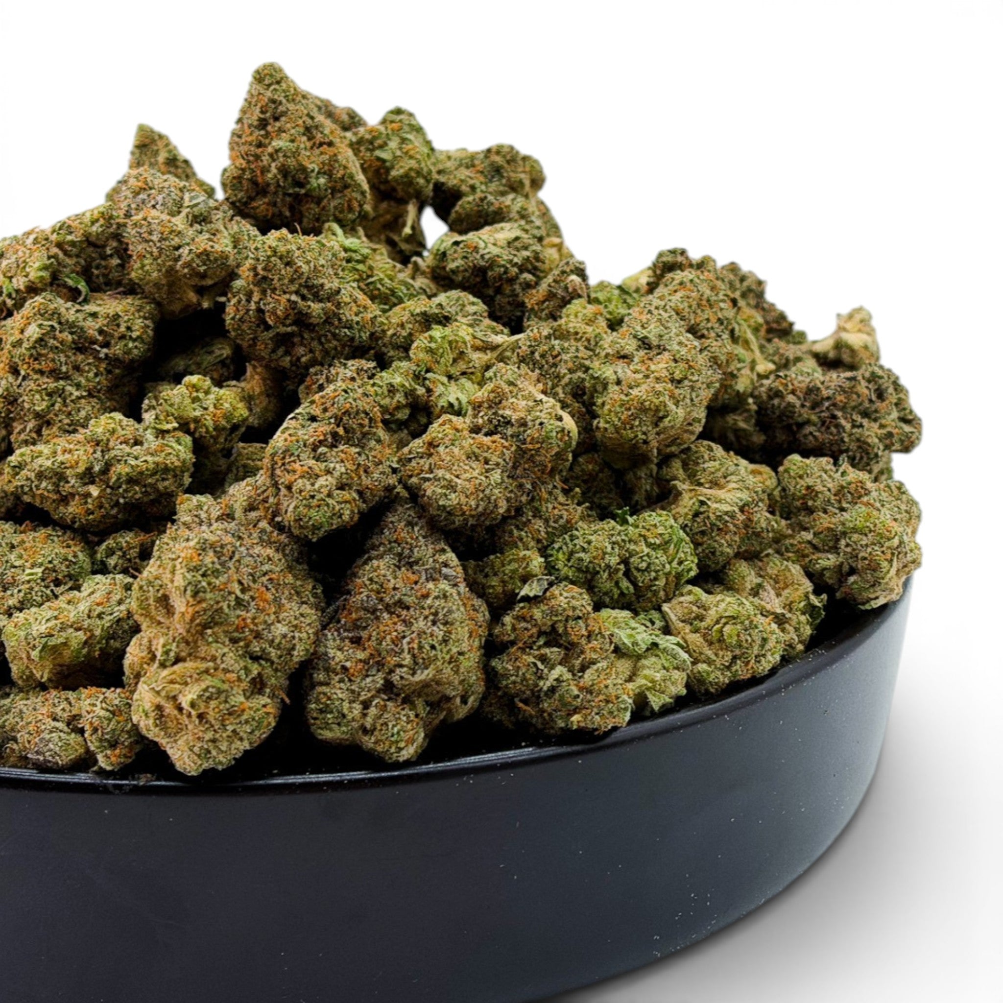 Dr. Wonderstone Ice Cream Pie THCa flower buds in a black bowl, featuring dense green nugs with thick trichomes.