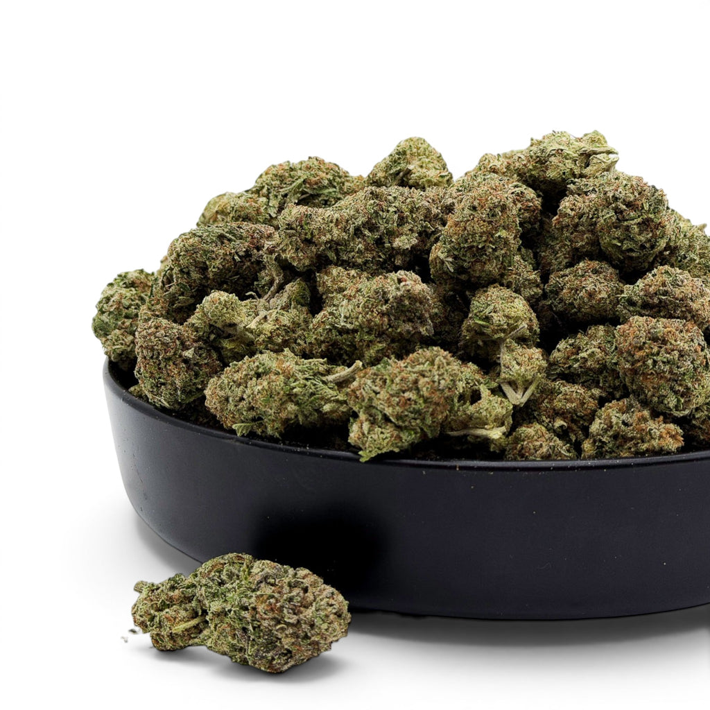 Dr. Wonderstone Illuminati indoor THCa flower buds with green and amber tones in a black bowl.