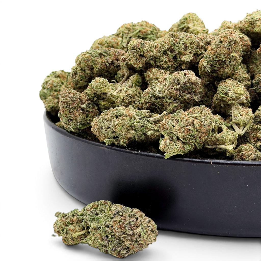 Dr. Wonderstone Illuminati indoor THCa flower buds with green and orange trichomes in a black bowl.