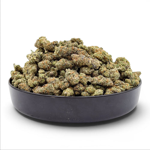 Dr. Wonderstone Northern Lights Exotic THCa flower buds with green and purple hues in a black bowl.