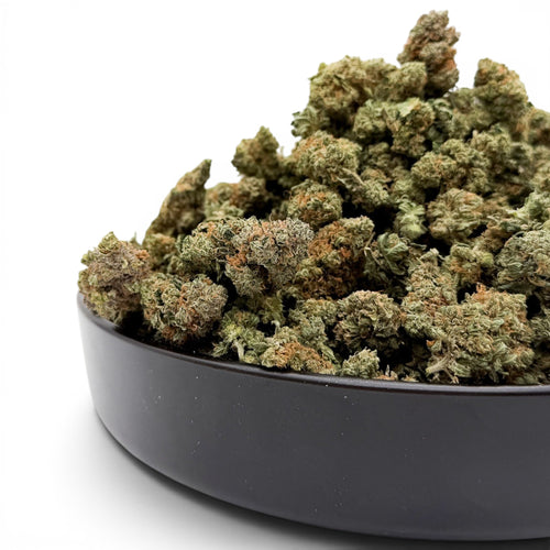 Dr. Wonderstone Pancakes premium THCa flower buds in a black bowl against a white background