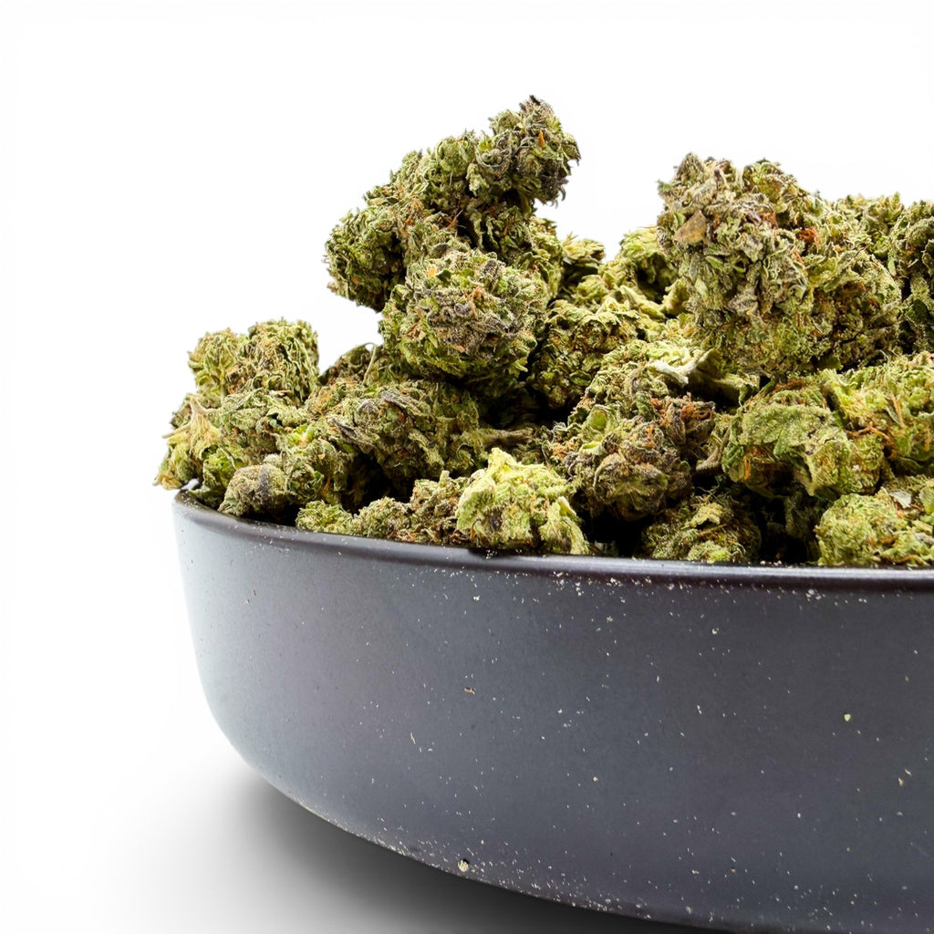 Dr. Wonderstone Pineapple hybrid THCa flower buds with dense green structure and trichomes in a black bowl.