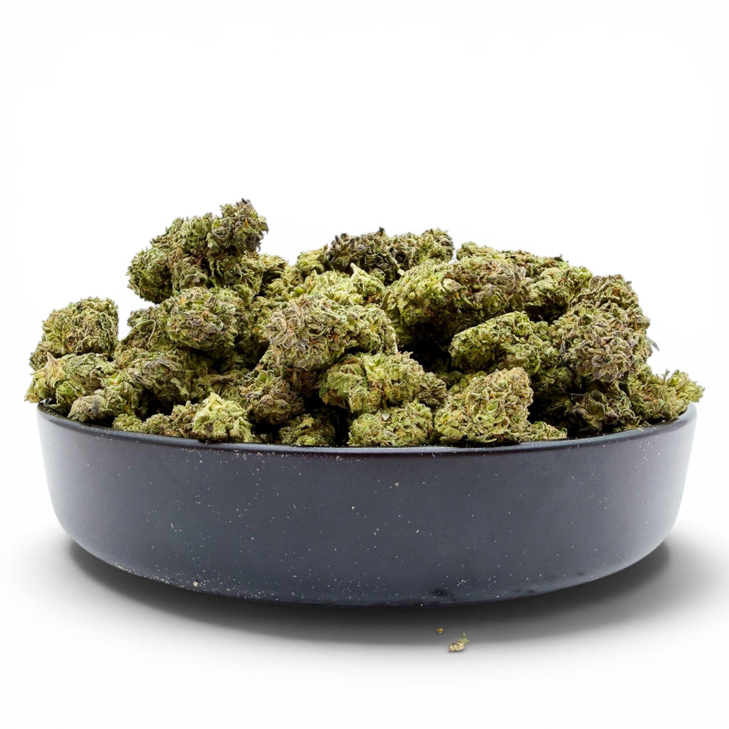 Dr. Wonderstone Pineapple hybrid THCa flower buds with dense structure and trichome coverage in a black bowl