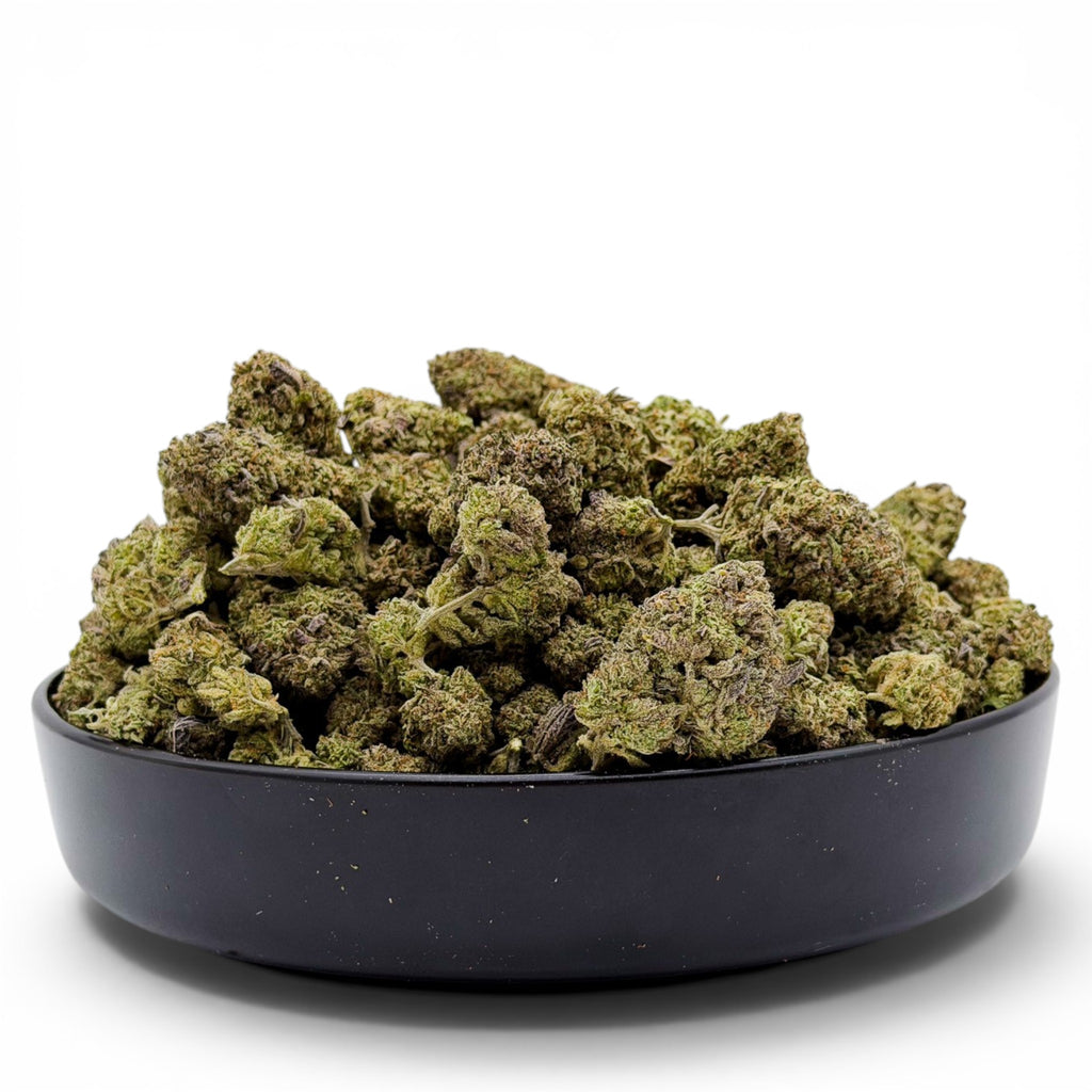 Dr. Wonderstone Pink Kush premium indoor THCa flower buds in a black bowl showing dense green structure and trichomes