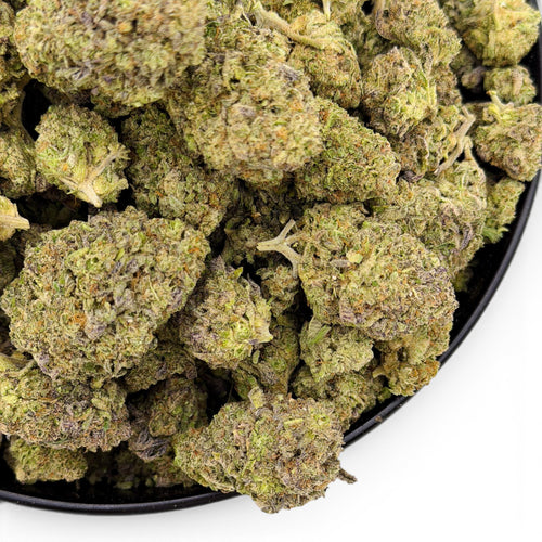 Dr. Wonderstone Pink Kush THCa flower buds with dense green structure, orange pistils, and heavy trichome coverage.