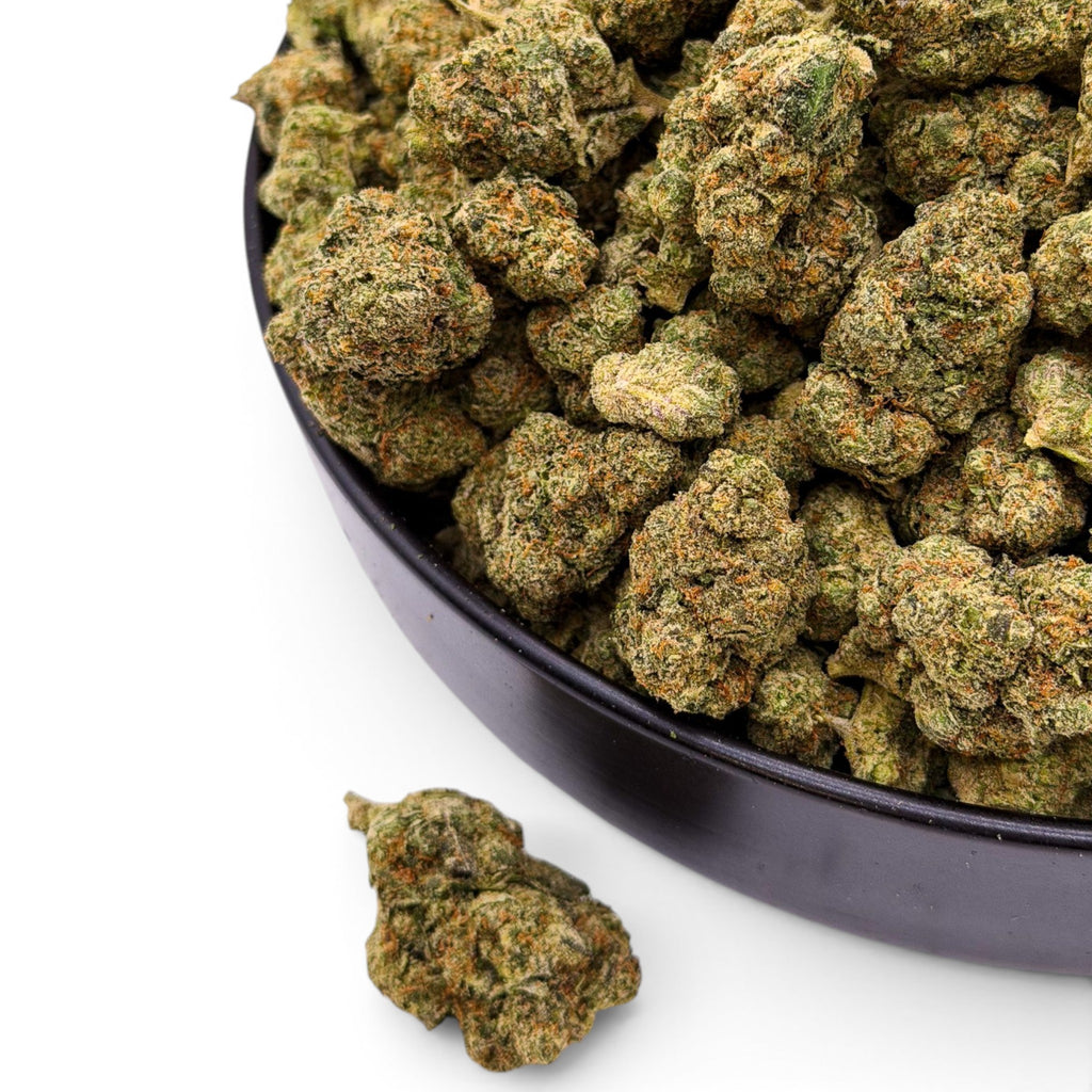 Dr. Wonderstone Purple Rhino exotic THCa flower buds with dense green texture and orange pistils in a black bowl