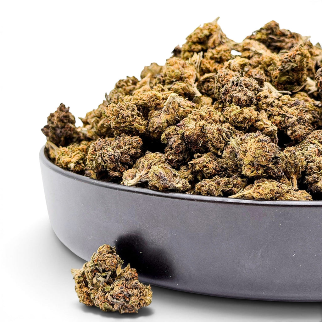 Dr. Wonderstone Runtz premium THCa flower buds piled in a dark grey bowl against a white background.