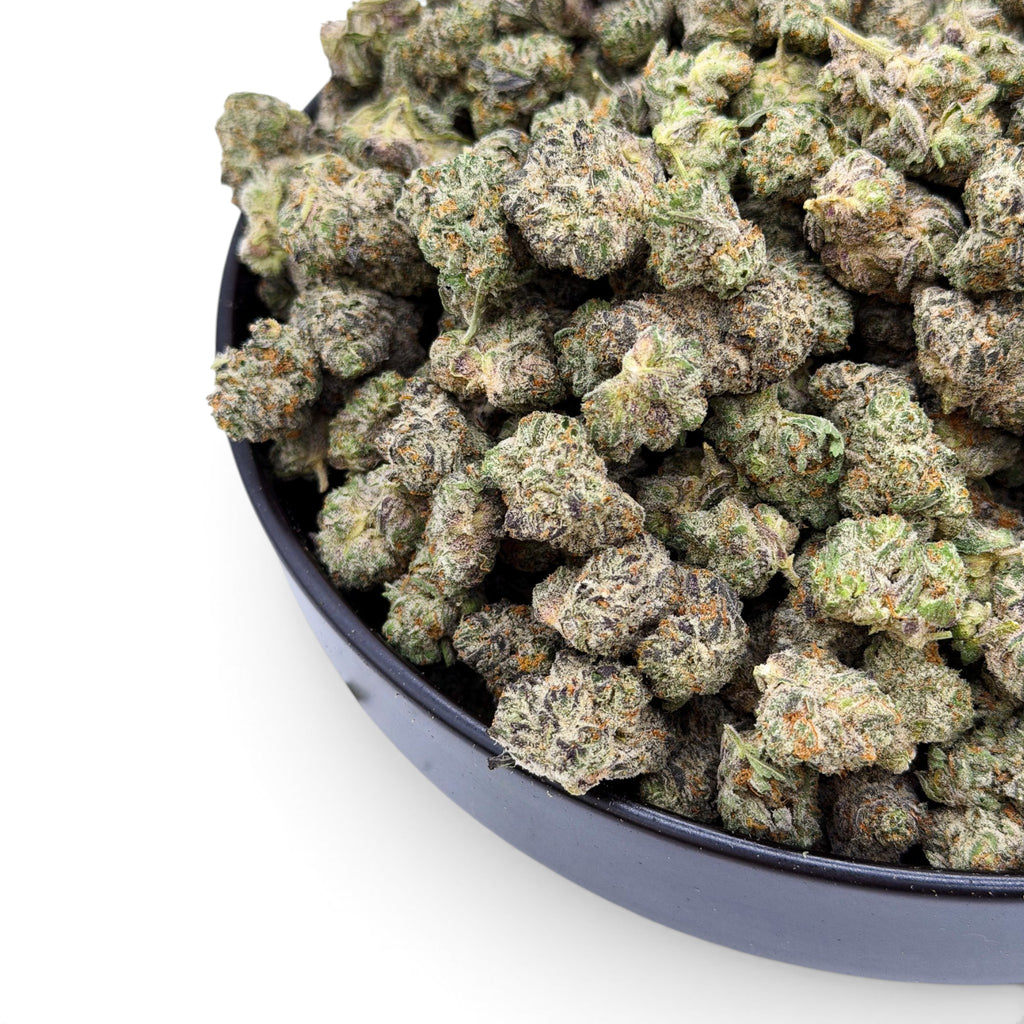 Dr. Wonderstone Secret Cookies THCa flower buds with frosty trichomes, deep green and purple hues, and orange pistils.