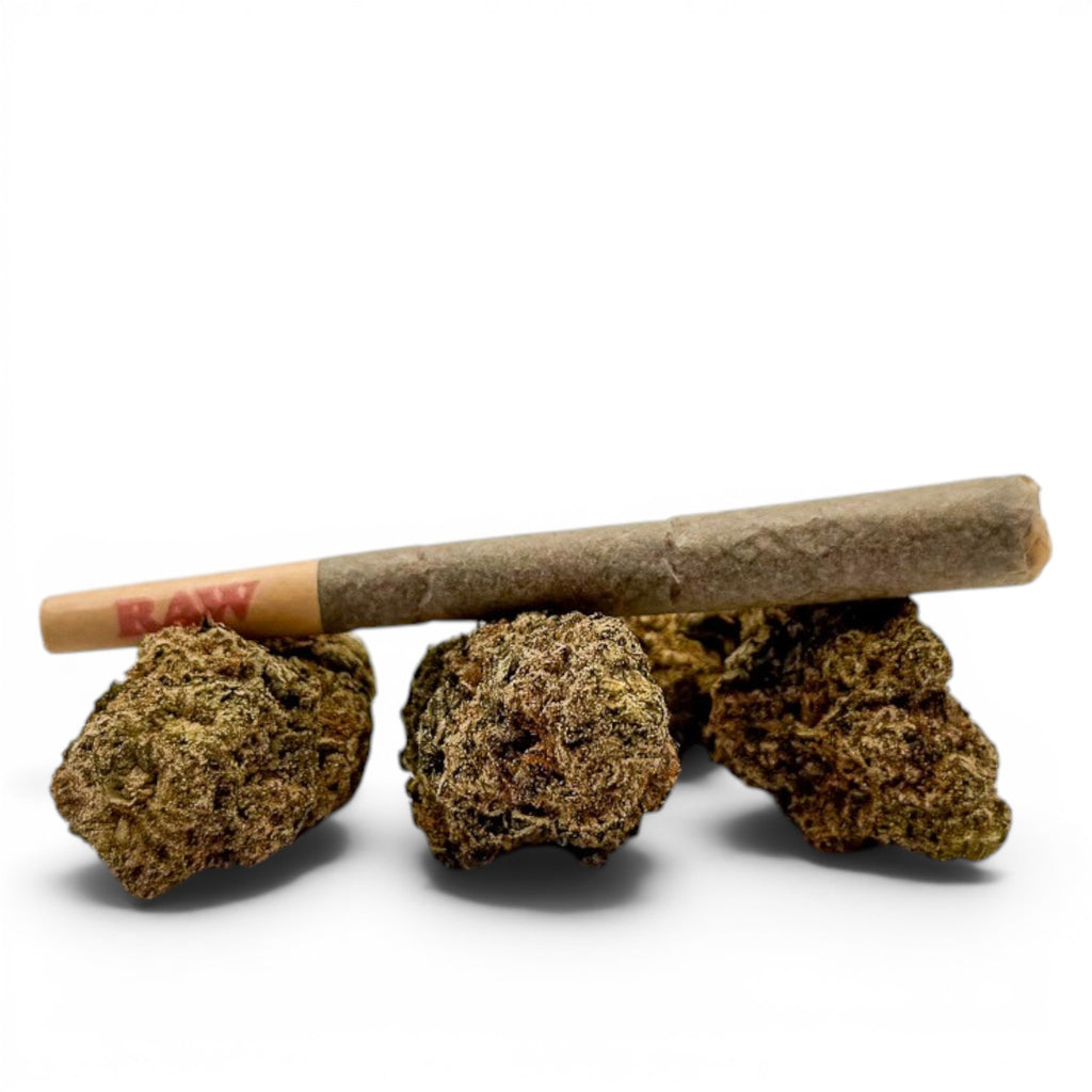 Dr. Wonderstone premium THCa hash hole joint resting on top of three dense, trichome-covered cannabis flower buds.