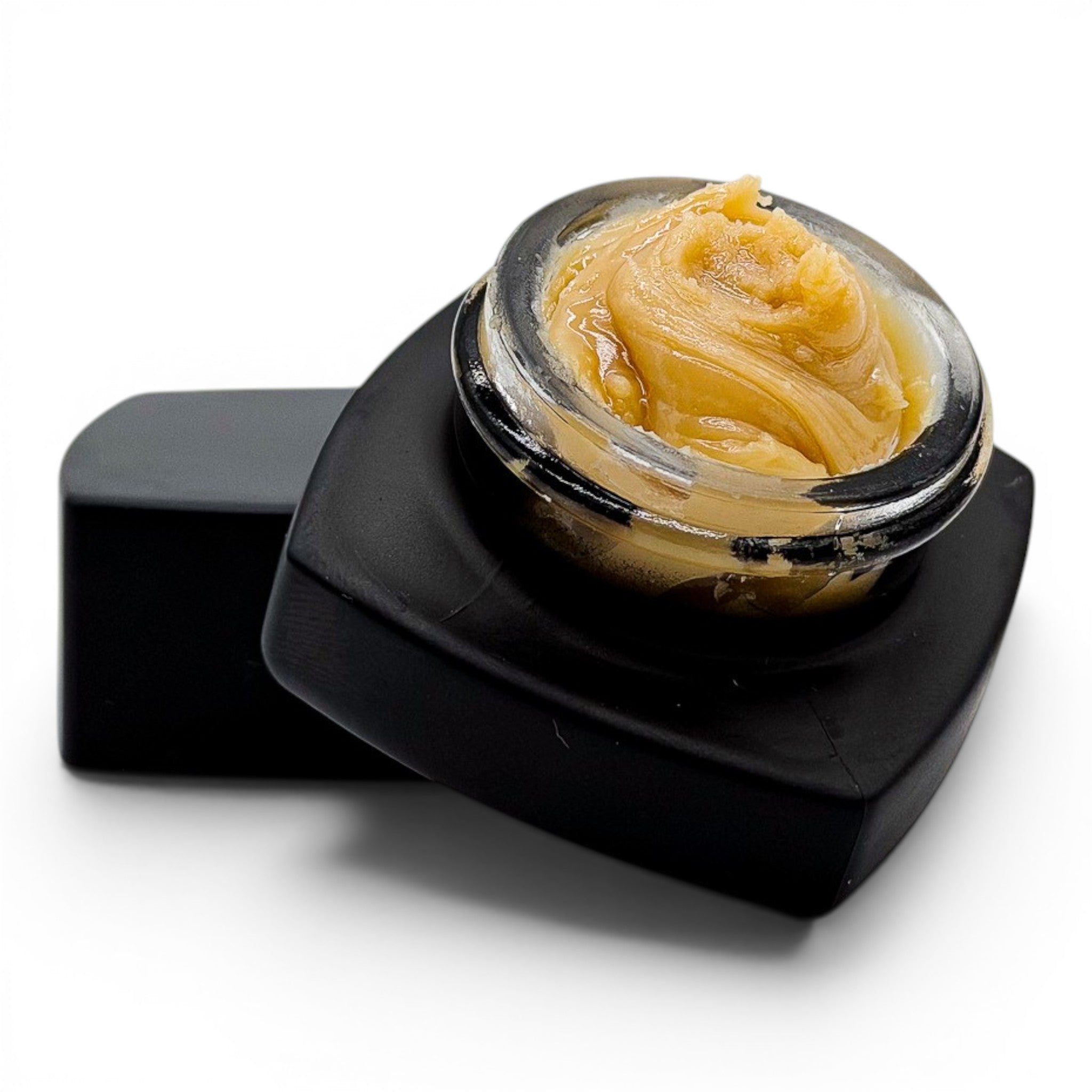 Dr. Wonderstone THCa premium live rosin concentrate with a smooth, buttery texture in a small black glass jar.