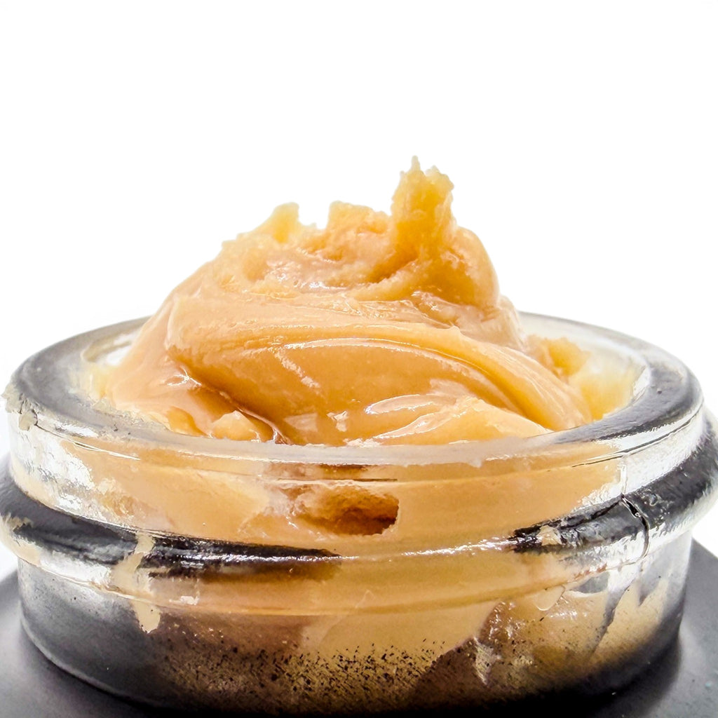 Dr. Wonderstone THCa premium live rosin concentrate with a smooth, buttery texture in a glass jar.