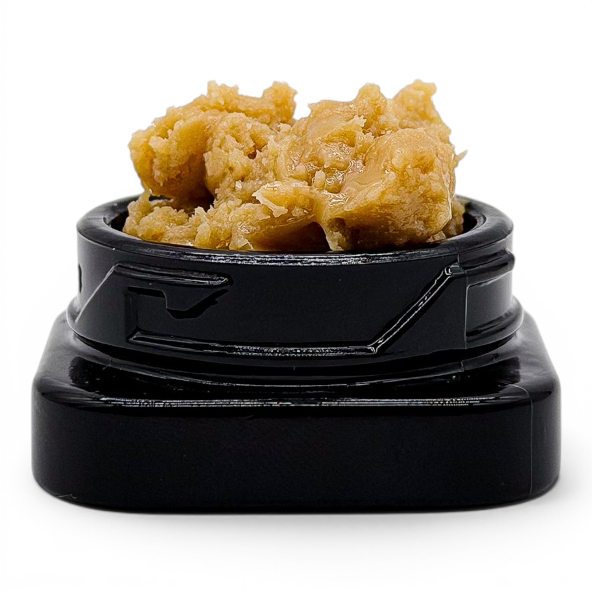 Dr. Wonderstone THCa premium live rosin concentrate with a buttery texture in a black jar against a white background.