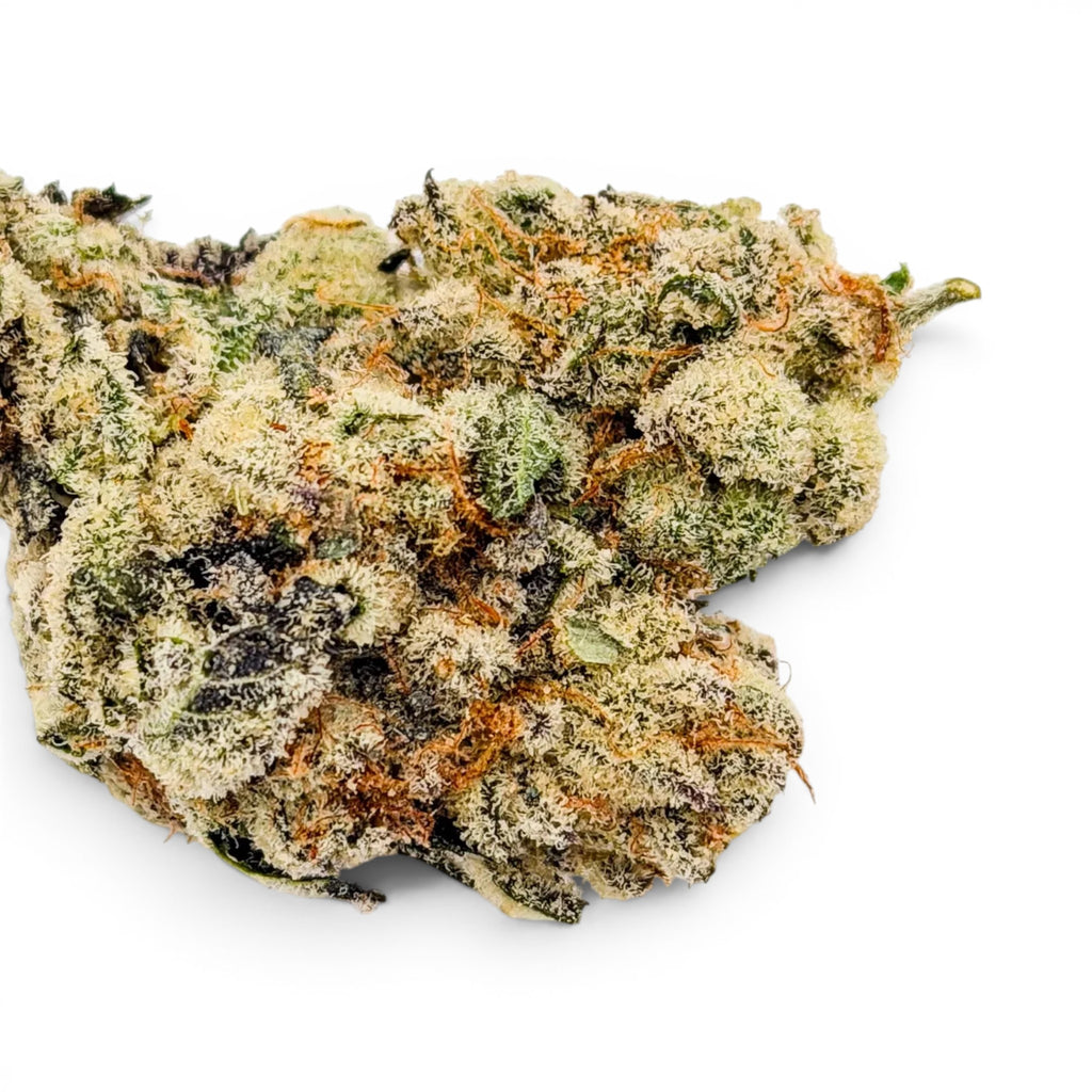 Dr. Wonderstone Toffee Headz premium THCa flower bud with dense green foliage, purple hues, and orange pistils.